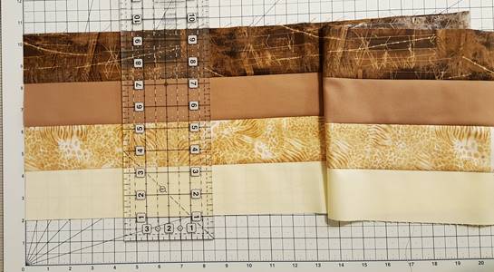 Neutral color Rail Fence Lap Quilt top measures 52x70 inches.